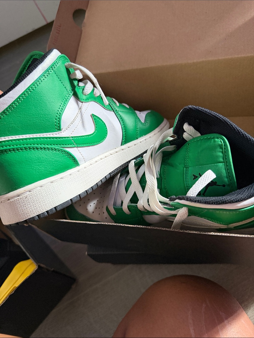 Nike Green and White 
Sneakers with Black Accents